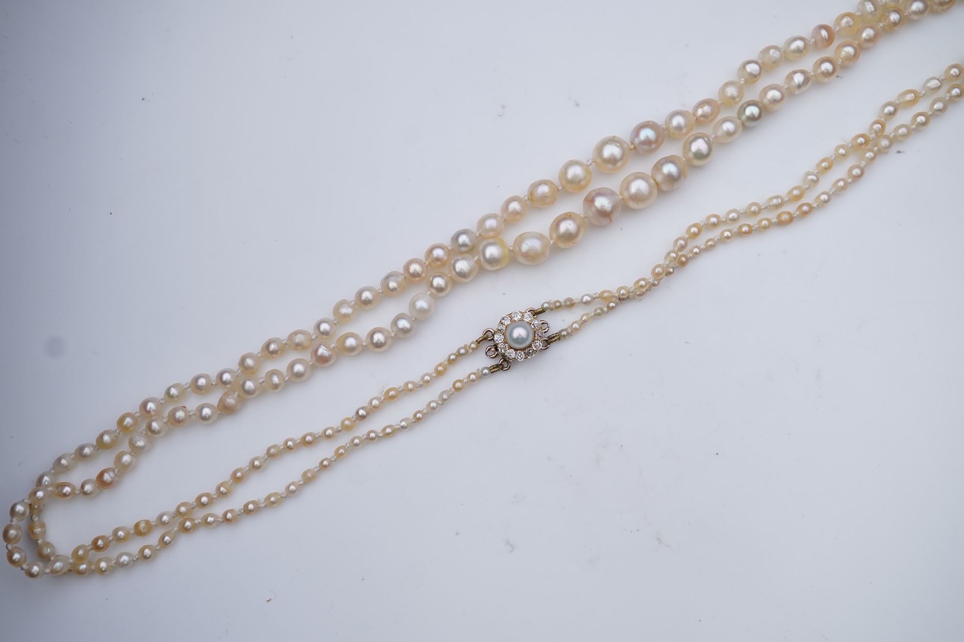 A natural pearl and diamond necklace, early 20th century